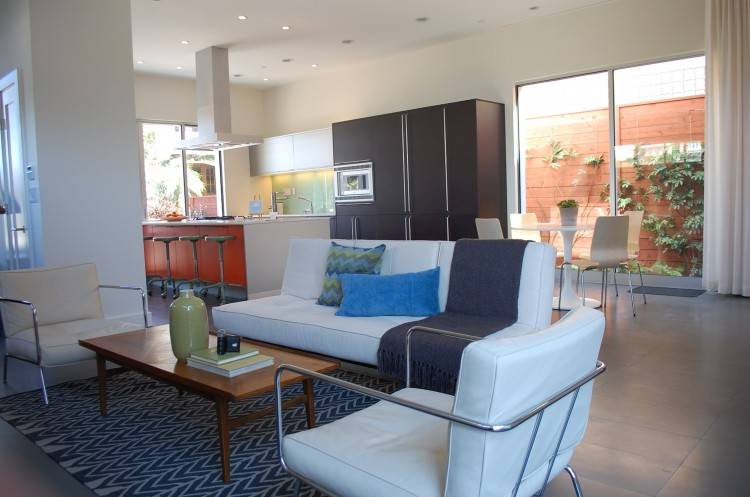 Industrial style dining room with a hint of blue [Design: Maxim  Lighting International]